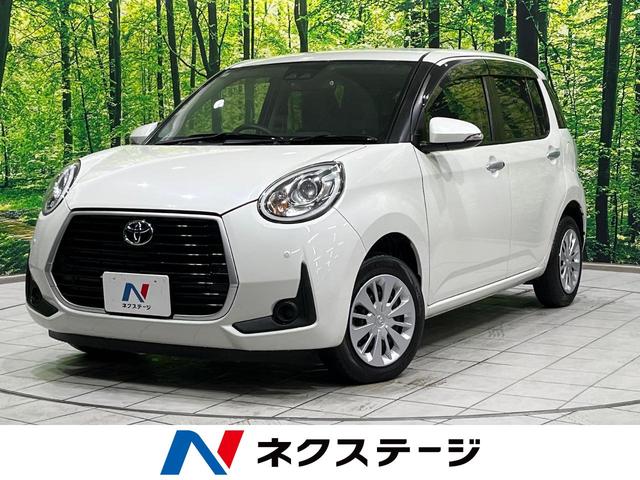 パッソ(トヨタ) モーダ 純正ナビ バックカメラ 衝突軽減装置 禁煙車 コーナーセンサー スマートキー LEDヘッド オートハイビーム 誤発進抑制機能 車線逸脱警報 先行車発進告知 オートライト オートエアコン フルセグ 中古車画像