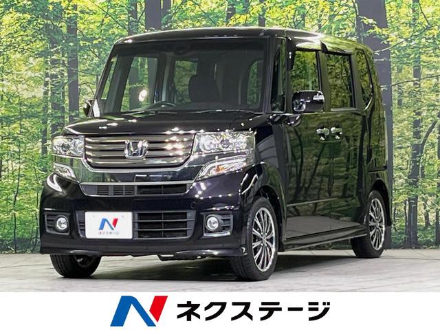 N−BOXカスタム(ホンダ) G ターボSSパッケージ 純正ナビ バックカメラ 衝突軽減装置 両側電動スライドドア ETC HIDヘッド 純正15インチアルミ スマートキー パドルシフト クルーズコントロール オートライト オートエアコン 盗難防止装置 中古車画像