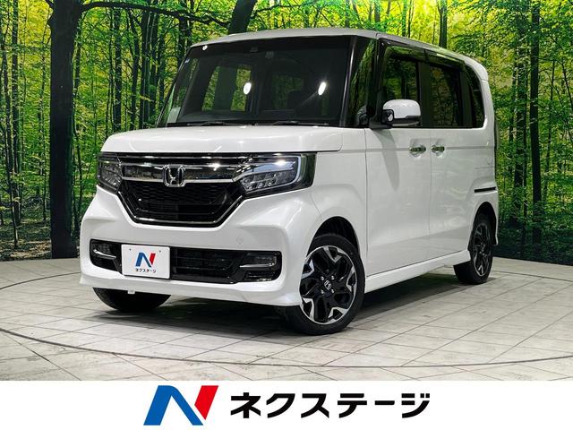 N−BOXカスタム(ホンダ) G・EXターボホンダセンシング 4WD ターボ 純正ナビ バックカメラ 衝突軽減 両側パワースライドドア LEDヘッド 革巻きステアリング パドルシフト シートヒーター 電動格納ミラー プッシュスタート ステリモ スマートキー 中古車画像