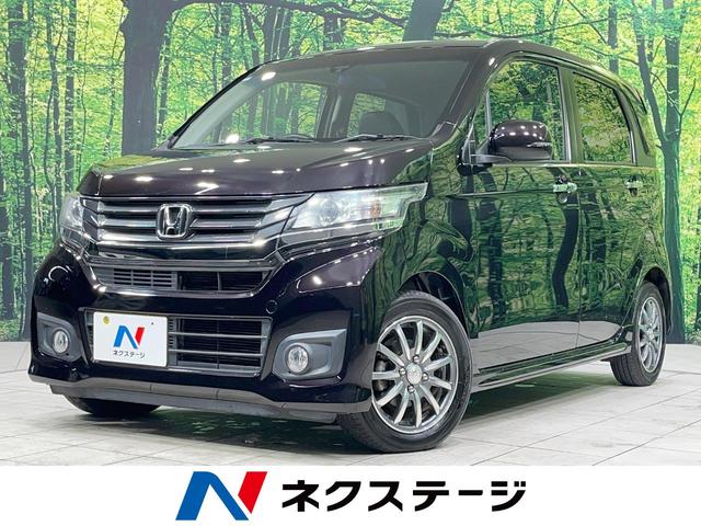 Ｎ−ＷＧＮカスタム(ホンダ) Ｇ・ターボパッケージ　禁煙車　ターボ　純正ナビ　バックカメラ　衝突軽減装置　ハーフレザーシート　ＨＩＤヘッド　ＥＴＣ　クルコン　オートライト　オートエアコン　Ｂｌｕｅｔｏｏｔｈ　ＣＤ／ＤＶＤ再生　スマートキー 中古車画像