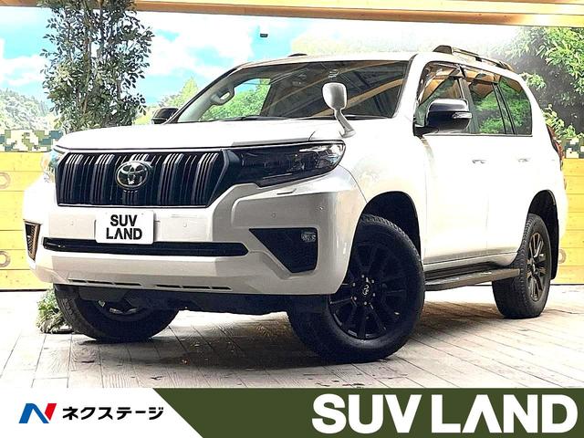 ランドクルーザープラド(トヨタ) ＴＸ　Ｌパッケージ　マットブラックエディション　禁煙車　ディーゼル　７人乗り　サンルーフ　バックカメラ　フリップダウンモニター　ＢＩＧ−Ｘ９インチナビ　パワーシート　革シート　シートベンチレーション　セーフティセンス　デュアルオートエアコン　ＥＴＣ 中古車画像