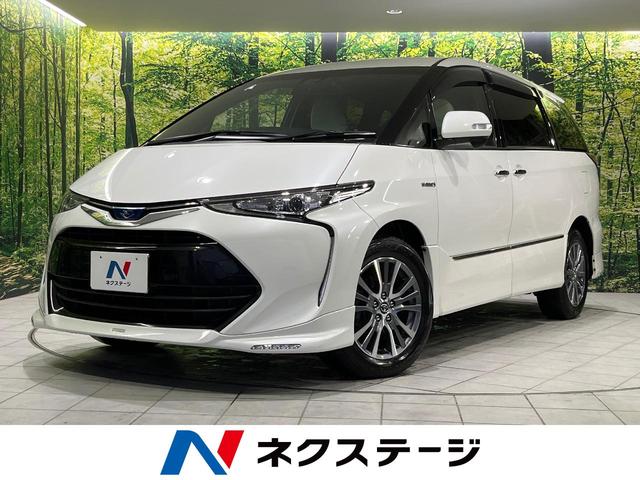 エスティマハイブリッド(トヨタ) アエラス　スマート　後期　４ＷＤ　ＴＲＤエアロ　両側電動スライド　衝突軽減　純正１０型ナビ　バックカメラ　ＥＴＣ　フルセグ　Ｂｌｕｅｔｏｏｔｈ　ドラレコ　スマートキー　シートヒーター　パワーシート　ホワイト合皮シート 中古車画像