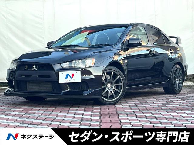ランサー(三菱) ＧＳＲエボリューションＸ　禁煙車　５ＭＴ　４ＷＤ　ターボ　ロックフォード　ブレンボ製キャリパー　ＥＮＫＥＩ製１８インチＡＷ　大型リアスポイラー　ＲＥＣＡＲＯシート　ＨＩＤヘッド　オートエアコン　革巻きステアリング　ＥＴＣ 中古車画像