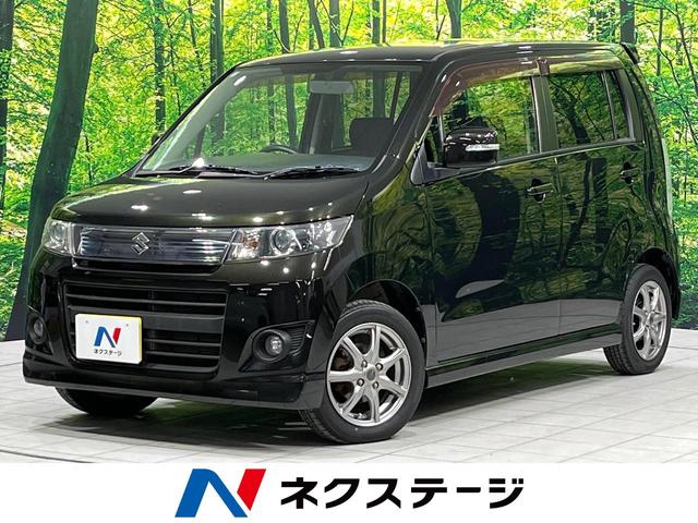 ワゴンＲスティングレー(スズキ) リミテッドＩＩ　４ＷＤ　禁煙車　ディスプレイオーディオ　バックカメラ　スマートキー　シートヒーター　ＨＩＤヘッドライト　革巻きステアリング　オートエアコン　１４インチアルミホイール　フォグライト　ＣＤ再生 中古車画像