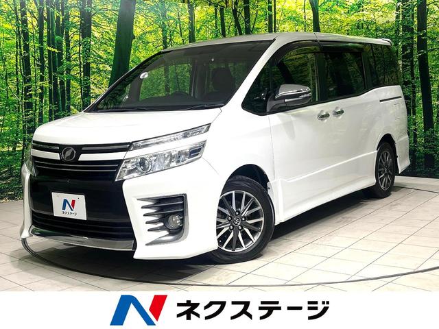 ヴォクシー ZS 煌 両側電動ドア 純正ナビ 禁煙車 スマートキー LEDヘッド ビルトインETC オートライト デュアルエアコン 純正16インチアルミ Bluetooth CD 地デジ LEDフォグ(1枚目)