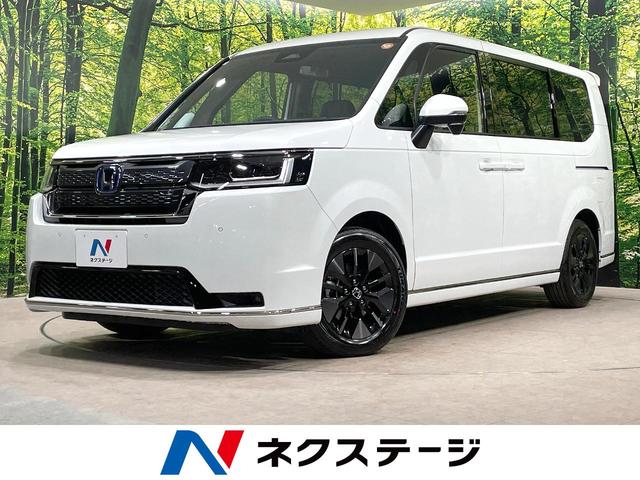 ステップワゴン e:HEVスパーダ 登録済未使用車 純正11.4型ナビ 両側電動ドア バックカメラ 衝突被害軽減 電動リアゲート レーダークルーズ シートヒーター コーナーセンサー LEDヘッド オートハイビーム 純正16インチアルミ(1枚目)