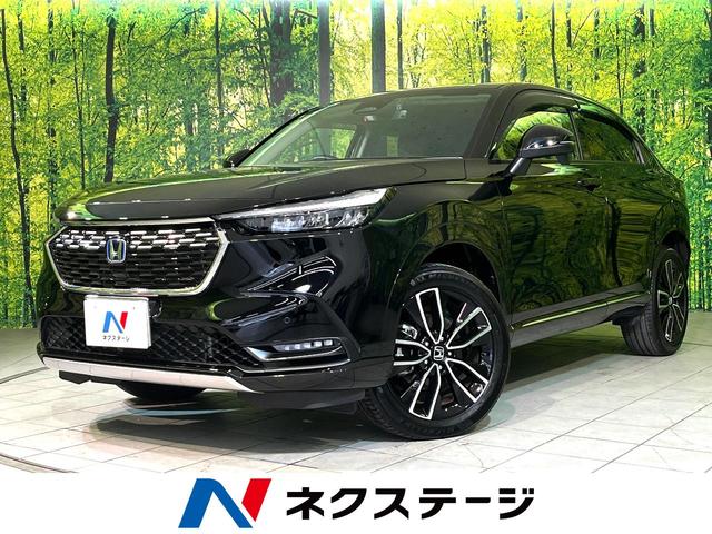 ヴェゼル(ホンダ) ｅ：ＨＥＶ　Ｚ　衝突軽減　純正８型ナビ　シートヒーター　バックカメラ　電動リアゲート　Ｂｌｕｅｔｏｏｔｈ接続　ＬＥＤヘッド　フルセグ　ドラレコ　ＣＤ／ＤＶＤ再生　デュアルオートエアコン　スマートキー　盗難防止装置 中古車画像