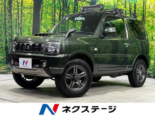 ジムニー(スズキ) ランドベンチャー　４ＷＤ　５ＭＴ　禁煙車　純正ＳＤナビ　シートヒーター　ドラレコ　ＥＴＣ　ハーフレザーシート　純正１６インチＡＷ　Ｂｌｕｅｔｏｏｔｈ再生　ＣＤ／ＤＶＤ再生　革巻きステアリング　フォグライト 中古車画像