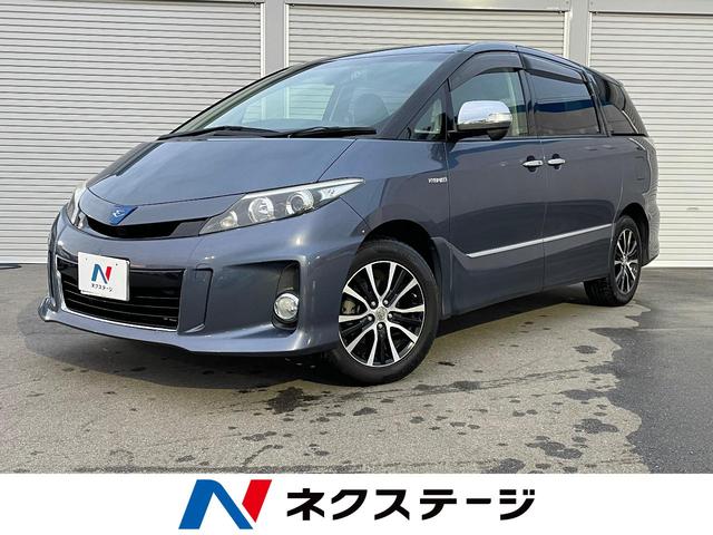 エスティマハイブリッド(トヨタ) アエラス　プレミアムエディション　４ＷＤ　両側電動ドア　ＳＤナビ　バックカメラ　禁煙車　ハーフレザーシート　パワーシート　ドラレコ　スマートキー　ＨＩＤヘッド　ビルトインＥＴＣ　オートライト　デュアルエアコン　純正１７インチアルミ 中古車画像