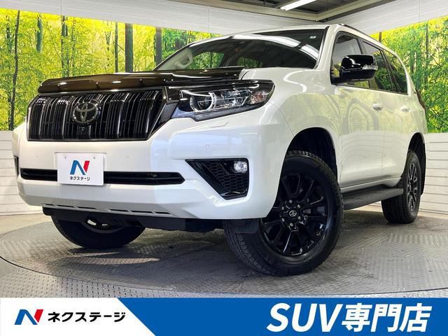 ランドクルーザープラド TX Lパッケージ 70thアニバーサリーリミテッド ムーンルーフ 4WD 7人乗り 純正9型ナビ セーフティセンス レーダークルーズ 禁煙車 パノラミックビューモニター ブラインドスポットモニター 本革シート 前席パワーシート シートエアコン(1枚目)