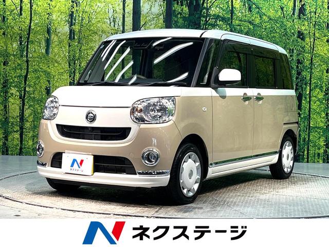 ムーヴキャンバス(ダイハツ) Ｘメイクアップリミテッド　ＳＡＩＩＩ　禁煙車　純正８型ナビ　両側電動スライドドア　全周囲カメラ　衝突軽減　フルセグＴＶ　Ｂｌｕｅｔｏｏｔｈ　ドラレコ　ＥＴＣ　オートライト　オートハイビーム　クリアランスソナー　アイドリングストップ 中古車画像