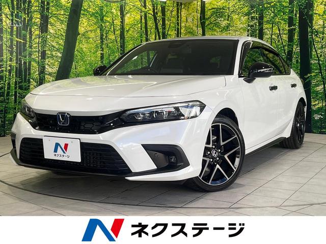 シビック(ホンダ) ｅ：ＨＥＶ　メーカー９型ナビ　ＢＯＳＥサウンドシステム　衝突被害軽減システム　アダプティブクルーズ　禁煙車　ドラレコ　ＥＴＣ　Ｂｌｕｅｔｏｏｔｈ　バックカメラ　コーナーセンサー　ＬＥＤヘッド　純正１８インチＡＷ 中古車画像