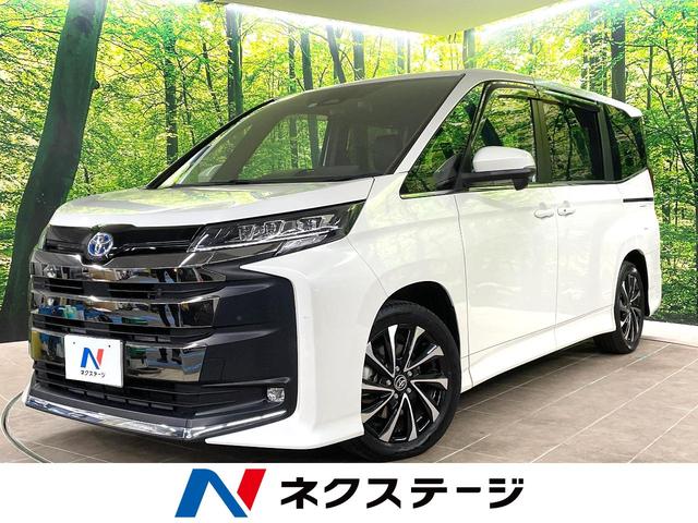 ノア(トヨタ) ハイブリッドＳ−Ｚ　純正１０型ナビ　両側電動ドア　バックカメラ　衝突軽減装置　レーダークルーズ　ＡＣ１００Ｖ　禁煙車　ハーフレザーシート　コーナーセンサ　ＬＥＤヘッド　ＥＴＣ２．０　純正１７インチＡＷ　オートハイビーム 中古車画像