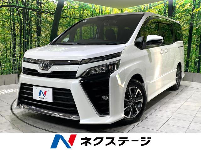 ヴォクシー(トヨタ) ＺＳ　禁煙車　両側パワースライドドア　純正ナビ　バックカメラ　セーフティセンス　クルーズコントロール　ＬＥＤヘッドライト　ＥＴＣ　ドライブレコーダー　アイドリングストップ　オートエアコン　オートライト 中古車画像
