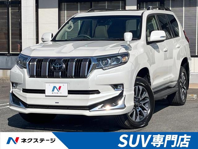 ランドクルーザープラド(トヨタ) ＴＸ　Ｌパッケージ　４ＷＤ　７人乗り　サンルーフ　モデリスタエアロ　バックカメラ　純正９型ナビ　セーフティセンス　レーダークルーズ　禁煙車　レザーシート　快適温熱シート　コーナーセンサー　ＬＥＤヘッド　ルーフレール 中古車画像