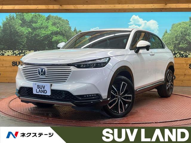 ヴェゼル(ホンダ) ｅ：ＨＥＶ　Ｚ　４ＷＤ　純正９型ナビ　バックカメラ　寒冷地仕様　ホンダセンシング　レーダークルーズ　禁煙車　電動リアゲート　ハーフレザーシート　シートヒーター　ドラレコ　コーナーセンサー　ＥＴＣ２．０ 中古車画像