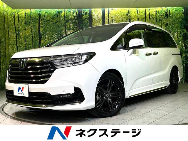 オデッセイハイブリッド(ホンダ) ｅ：ＨＥＶアブソルート・ＥＸ　純正１０インチナビ　全周囲カメラ　レザーシート　ハンズフリーパワーバックドア　ホンダセンシング　両側電動スライドドア　コーナーセンサー　アダプティブクルーズコントロール　ドラレコ　スマートキー 中古車画像