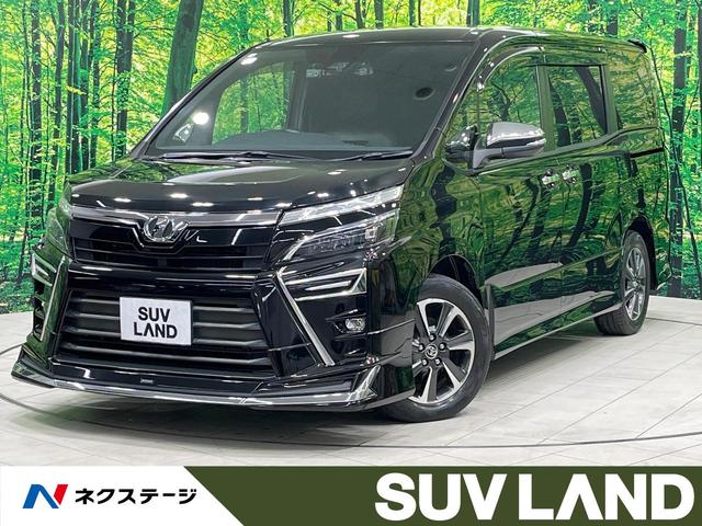 ヴォクシー(トヨタ) ＺＳ　煌　禁煙車　モデリスタエアロ　後席モニター　１１型ＢＩＧＸ　フルセグ　バックカメラ　両側電動スライド　セーフティセンス　クリアランスソナー　ＬＥＤヘッド＆フォグ　純正１６インチアルミ　アイドリングストップ 中古車画像