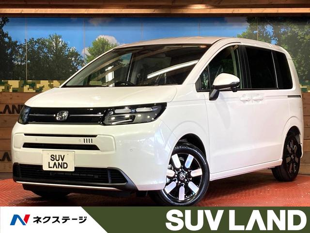 フリード　愛知県 登録済未使用車　両側電動ドア　衝突被害軽減システム　ハーフレザーシート