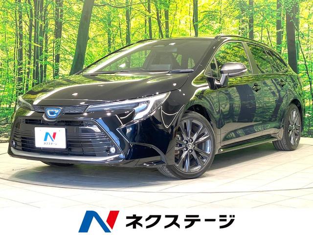 カローラツーリング(トヨタ) ハイブリッド　ダブルバイビー　禁煙車　純正１０．５型ナビ　バックカメラ　衝突被害軽減システム　レーダークルーズ　ＢＳＭ　ハーフレザー　前席シートヒーター　コーナーセンサー　ＬＥＤヘッド　ＥＴＣ２．０　純正１７インチＡＷ 中古車画像