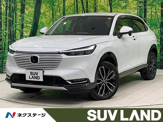 ヴェゼル(ホンダ) ｅ：ＨＥＶ　Ｚ　禁煙車　純正９型ナビ　レーダークルーズ　バックカメラ　電動リアゲート　ハーフレザーシート　コーナーセンサー　スマートキー　ＬＥＤヘッド　ＥＴＣ　純正１８インチアルミ　オートハイビーム　車線逸脱警報 中古車画像