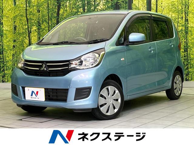 ｅＫワゴン(三菱) Ｍ　ナビ　バックカメラ　シートヒーター　ＥＴＣ　オートエアコン　ＣＤ／ＤＶＤ再生　地デジ　ベンチシート　ドアバイザー　プライバシーガラス　アイドリングストップ　盗難防止装置　電動格納ドアミラー 中古車画像