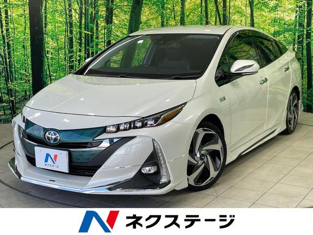 プリウスＰＨＶ(トヨタ) Ａプレミアム　禁煙車　モデリスタ　１１．６型ナビ　衝突軽減　レーダークルーズ　ＢＳＭ　ＨＵＤ　パーキングアシスト　合皮レザー　パワーシート　シートヒーター　ステアリングヒーター　クリアランスソナー　モデリスタアルミ 中古車画像