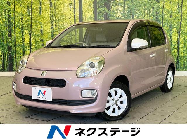 パッソ（トヨタ）プラスハナ　禁煙車　純正ＳＤナビ　バックカメラ　ドラレコ　ＥＴＣ　Ｂｌｕｅｔｏｏｔｈ再生　オートエアコン　アイドリングストップ　スマートキー　純正１４インチアルミ　フォグライト　電動格納ミラー 中古車画像