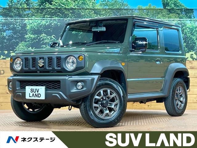 ジムニーシエラ(スズキ) ＪＣ　禁煙車　純正８型ナビ　セーフティサポート　クルコン　ＬＥＤヘッド　シートヒーター　バックカメラ　ＥＴＣ　オートライト　フルセグ　オートエアコン　純正１５インチアルミホイール 中古車画像