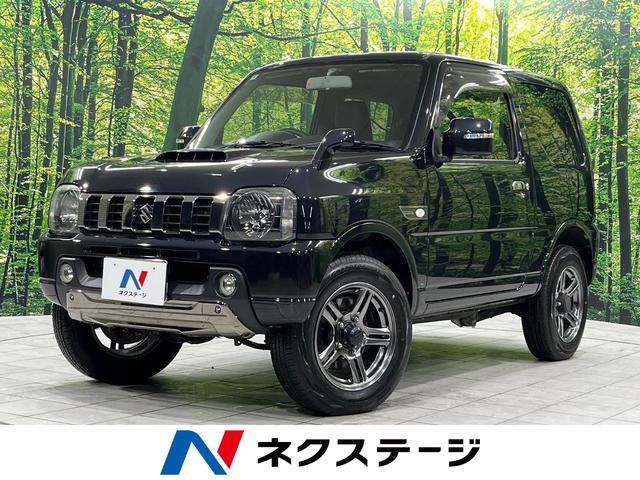ジムニー(スズキ) ランドベンチャー　ＳＤナビ　禁煙車　シートヒーター　電動格納ミラー　革巻きステアリング　プライバシーガラス　ドアバイザー　電動格納ミラー　パワーステアリング　パワーウィンドウ　フルセグ　盗難防止システム　衝突安全ボディ 中古車画像