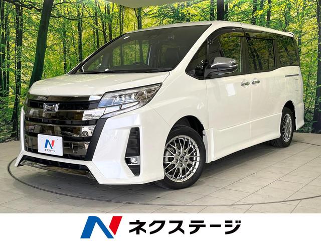 ノア(トヨタ) ハイブリッドＳｉ　ダブルバイビーＩＩＩ　両側電動ドア　純正１０型ナビ　後席モニター　バックカメラ　衝突被害軽減システム　禁煙車　ハーフレザーシート　ドラレコ　コーナーセンサー　ＬＥＤヘッド　ビルトインＥＴＣ　クルコン　純正１６インチアルミ 中古車画像
