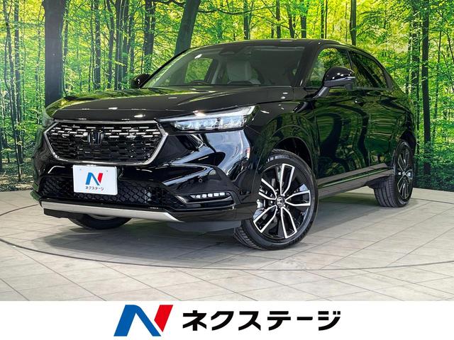 ヴェゼル(ホンダ) ｅ：ＨＥＶ　Ｚ　４ＷＤ　純正ナビ　寒冷地仕様　バックカメラ　Ｂｌｕｅｔｏｏｔｈ　ＥＴＣ　ドラレコ　パワーバックドア　ブラインドスポットモニター　シートヒーター　ＬＥＤヘッド　革巻きステアリング　プッシュスタート 中古車画像
