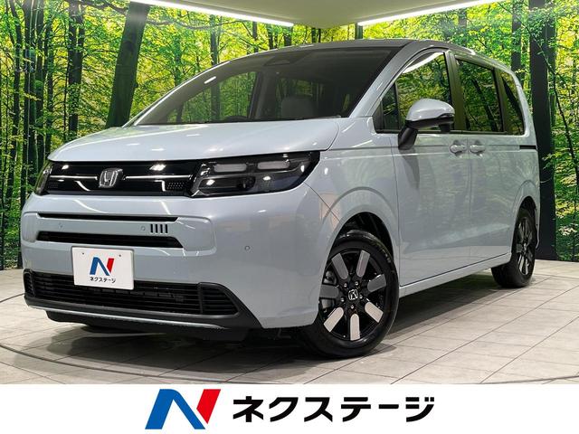 フリード(ホンダ) エアー　ＥＸ　登録済未使用車　純正９型ナビ　両側電動スライドドア　ＢＳＭ　シートヒーター 中古車画像