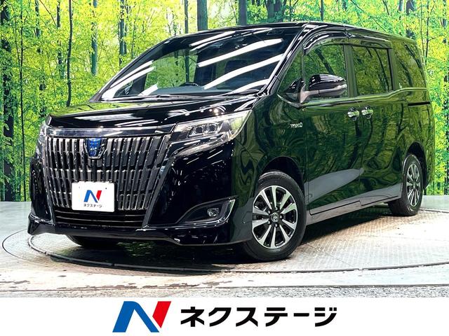 エスクァイア(トヨタ) ハイブリッドＧｉ　禁煙車　両側電動ドア　後席モニター　バックカメラ　衝突被害軽減装置　ドラレコ　コーナーセンサー　スマートキー　ＬＥＤヘッド　ＥＴＣ　クルコン　純正１５インチアルミ　オートハイビーム 中古車画像