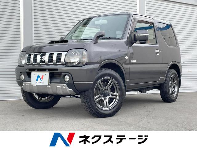 ジムニー(スズキ) クロスアドベンチャー　４ＷＤ　ターボ　禁煙車　純正１６インチアルミ　ＣＤ　ＤＶＤ再生　地デジ 中古車画像