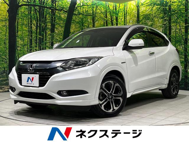 ヴェゼル(ホンダ) ハイブリッドＺ　純正ナビ　バックカメラ　ＥＴＣ　ドラレコ　フルセグ　Ｂｌｕｅｔｏｏｔｈ　ＬＥＤヘッド　革巻きステアリング　シートヒーター　パドルシフト　オートライト　オートエアコン　プッシュスタート　スマートキー 中古車画像