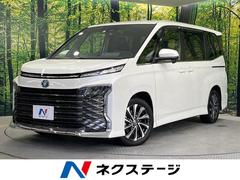 ヴォクシー ハイブリッドS-Z 禁煙車 純正10.5インチディスプレイオーディオ バックカメラ フリップダウンモニター CD/DVD Apple CarPlay 両側電動スライドドア レーダークルーズコントロール ドラレコ ETC 中古車画像