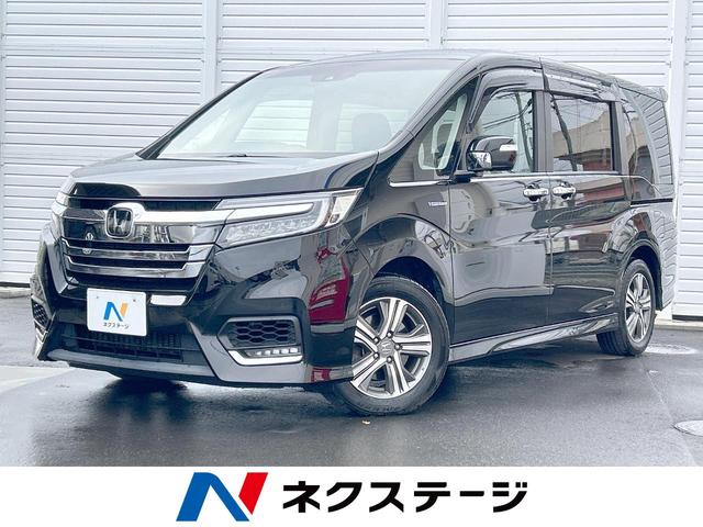 ステップワゴンスパーダ(ホンダ) スパーダハイブリッド　Ｇ・ＥＸ　ホンダセンシング　純正９型インターナビ　フリップダウンモニター　両側電動ドア　アダプティブクルーズコントロール 中古車画像