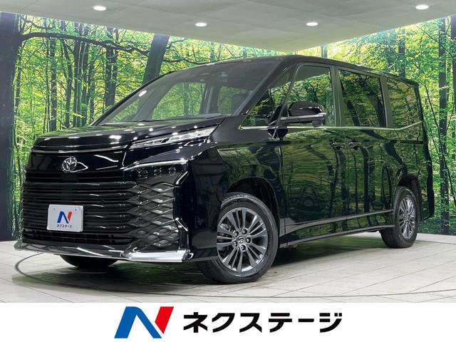 ヴォクシー(トヨタ) Ｓ−Ｚ　４ＷＤ　純正１０．５型ナビ　両側パワースライドドア　バックカメラ　セーフティセンス　レーダークルコン　クリアランスソナー　寒冷地仕様　前席シートヒーター　ＥＴＣ　ドラレコ　ＣＤ／ＤＶＤ／フルセグ 中古車画像