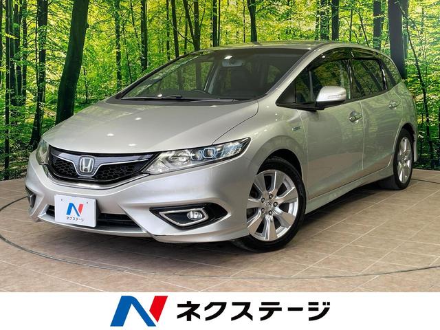 ジェイド(ホンダ) ハイブリッドＸ　１年保証付　後席モニター　バックカメラ　衝突被害軽減システム　レーダークルーズ　禁煙車　ハーフレザーシート　スマートキー　ＬＥＤヘッド　ビルトインＥＴＣ　純正１７インチアルミ　車線逸脱警報 中古車画像