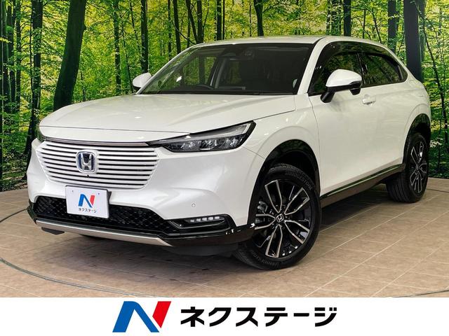 ヴェゼル(ホンダ) ｅ：ＨＥＶ　Ｚ　１年保証付　禁煙車　衝突軽減装置　純正ナビ　全周囲カメラ　レーダークルーズ　ドライブレコーダー　ＥＴＣ　ＬＥＤヘッドライト　電動リアゲート　ブラックハーフレザー　Ｂｌｕｅｔｏｏｔｈ再生　フルセグＴＶ 中古車画像