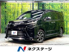 ヴォクシー ZS 煌 禁煙車 両側電動ドア フリップダウンモニター アルパイン11インチナビ バックカメラ 衝突被害軽減システム スマートキー LEDヘッド ETC クルコン 純正16インチアルミ 車線逸脱警報 中古車画像