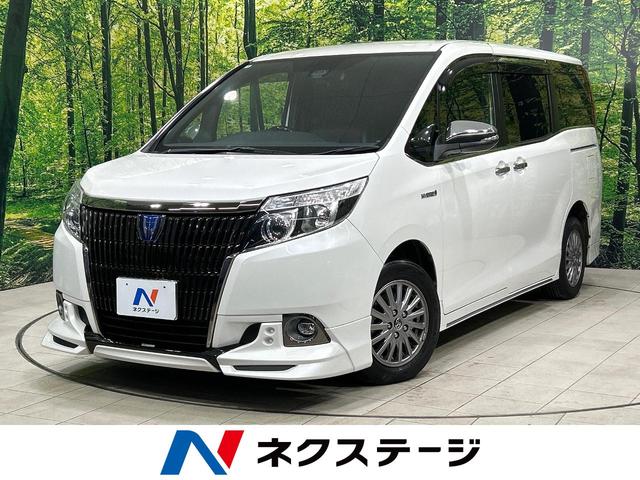 エスクァイア(トヨタ) ハイブリッドＧｉ　ブラックテーラード　ＴＲＤエアロ　ＢＩＧ−Ｘ９型ナビ　フリップダウンモニター　バックカメラ　両側パワスラ　シ−トヒ−タ−　セ−フティセンス　クルーズコントロール　リアオ−トエアコン　ＬＥＤヘッドライト　ＥＴＣ　禁煙車 中古車画像