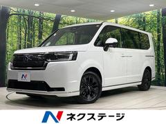 ステップワゴン e:HEVスパーダ 登録済未使用車 純正11.4型ナビ 両側パワースライドドア バックカメラ ホンダセンシング アダプディブクルコン パワーバックドア シートヒーター 二列目オットマン ハーフレザーシート パドルシフト 中古車画像