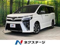 ヴォクシー ZS 煌 4WD 純正10型ナビ 衝突軽減 両側電動ドア リアオートエアコン クルコン Bluetooth フルセグ バックカメラ LEDヘッド 8人乗り オートハイビーム 車線逸脱警報 ドラレコ ETC 中古車画像