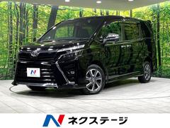 ヴォクシー ZS 煌II 4WD 純正ナビ 後席モニター 寒冷地仕様 両側電動スライド 衝突軽減 車線逸脱警報 オートハイビーム LEDヘッド・フォグ コーナーセンサー バックカメラ ETC ドラレコ ウッドコンビステアリング 中古車画像