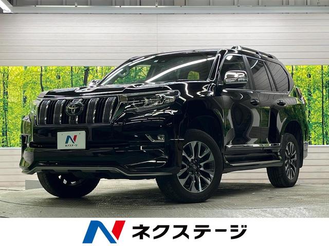 ランドクルーザープラド(トヨタ) ＴＸ　Ｌパッケージ　ムーンルーフ　モデリスタエアロ　純正ＯＰ１９インチＡＷ　禁煙車　純正９型ナビＴＶ　マルチテレインモニタ　黒革　セーフティセンス　パワーシート　ポジションメモリ　シートベンチレーション　１４スピーカー 中古車画像