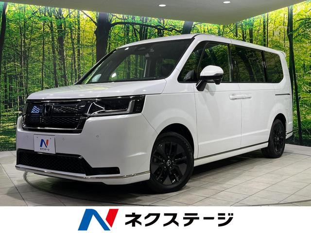 ステップワゴン(ホンダ) スパーダ　４ＷＤ　両側電動スライド　ＳＤナビ　バックカメラ　寒冷地仕様　ホンダセンシング　禁煙車　パワーバックドア　合皮シート　前席シートヒーター　ドラレコ　コーナーセンサー　スマートキー　ＬＥＤヘッド　ＥＴＣ 中古車画像