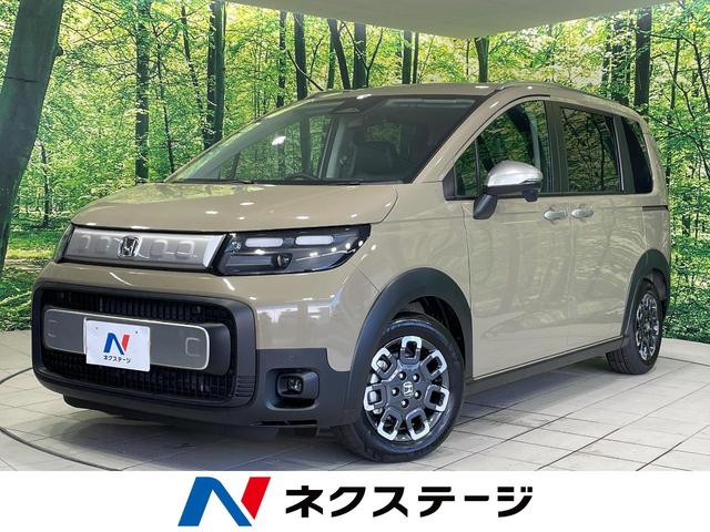 フリード(ホンダ) クロスター　登録済未使用車　純正９型ナビ　両側電動スライドドア　バックカメラ　衝突被害軽減システム　レーダークルーズ　ハーフレザーシート　コーナーセンサー　スマートキー　ＬＥＤヘッド　純正１５インチアルミ 中古車画像