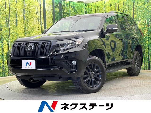 ランドクルーザープラド(トヨタ) ＴＸ　Ｌパッケージ　マットブラックエディション　４ＷＤ　７人乗り　サンルーフ　フリップダウンモニター　純正９型ナビ　全周囲カメラ　衝突被害軽減　レーダークルーズ　ＨＤＭＩ接続　禁煙車　ベージュ革シート　シートエアコン　前後ドラレコ　コーナーセンサー 中古車画像